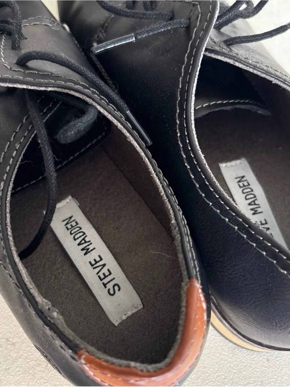 Steve Madden  Black Lace-Up Shoes with Brown Heel Accent